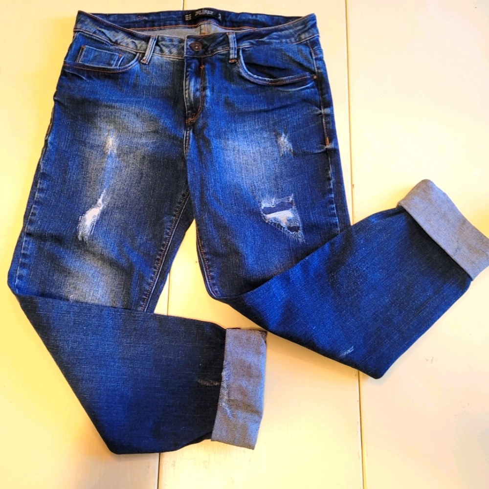 Distressed cuffed jeans by Zara